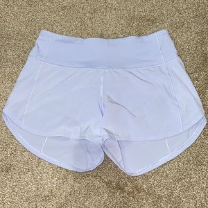 LULULEMON SIZE 4 TALL PURPLE SHORTS